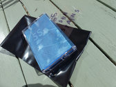Cassette with sun reactive artwork