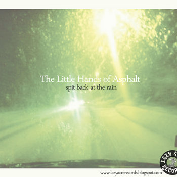 Spit Back At The Rain (UK edition) cover art